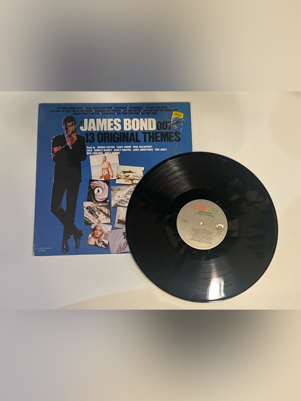 ⁠James Bond 007 13 Original Themes Vintage 1983 Vinyl LP Liberty LO-51138 Shrink